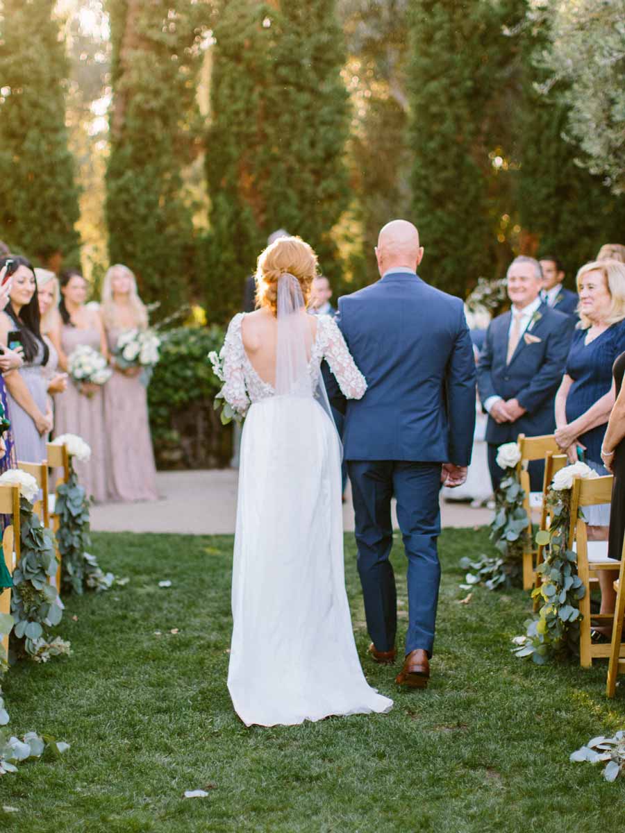 Dad Walking Daughter Down The Aisle.