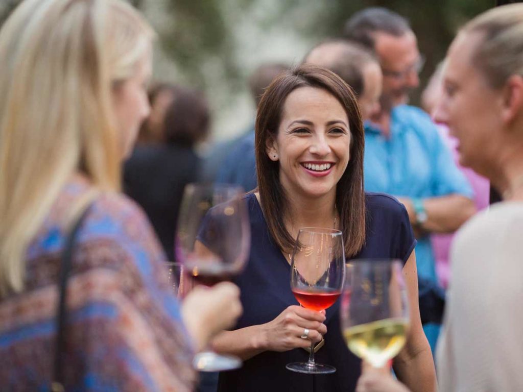 Ladies At And Event With Wine.