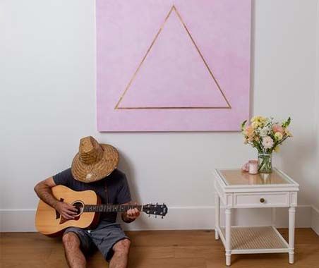 Guy Plating Guitar.