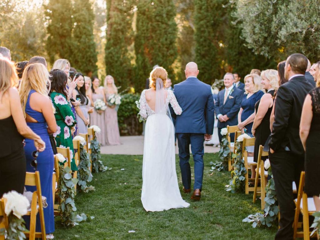 Dad Walking Daughter Down The Aisle.