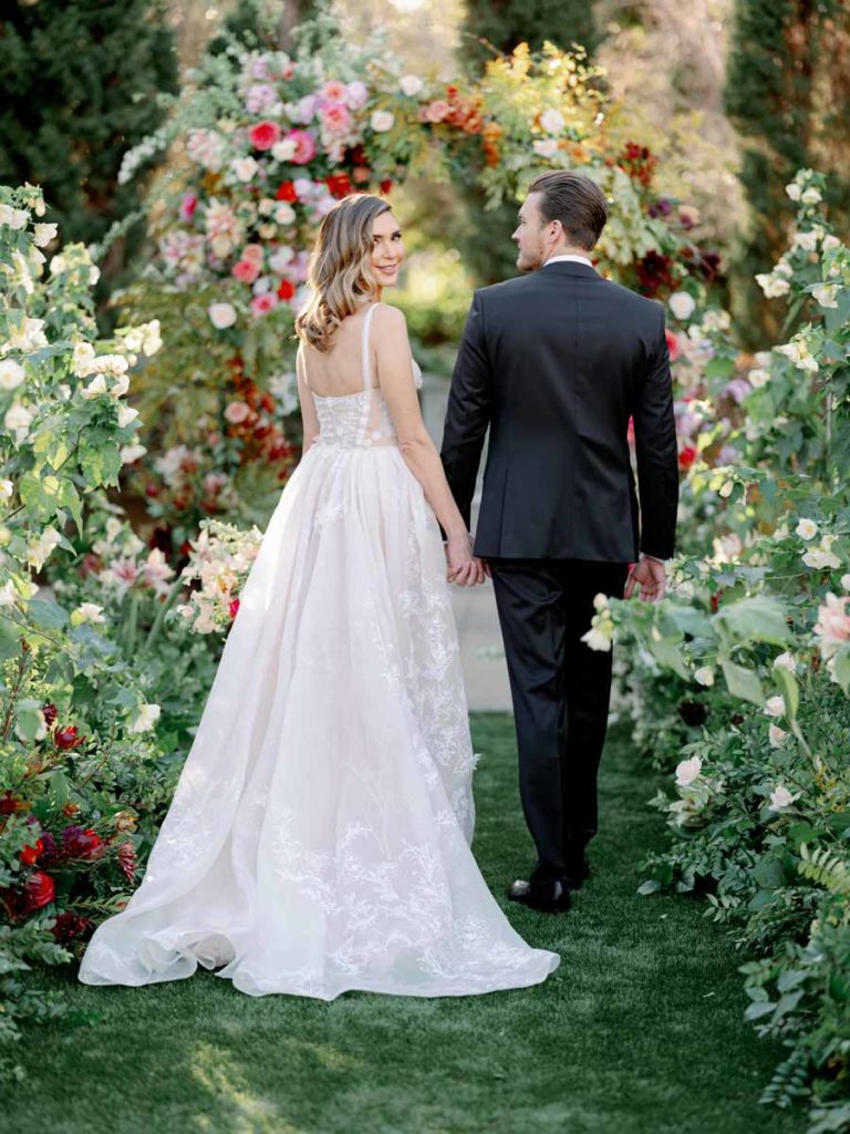 Bride And Groom With Wedding Flowers.