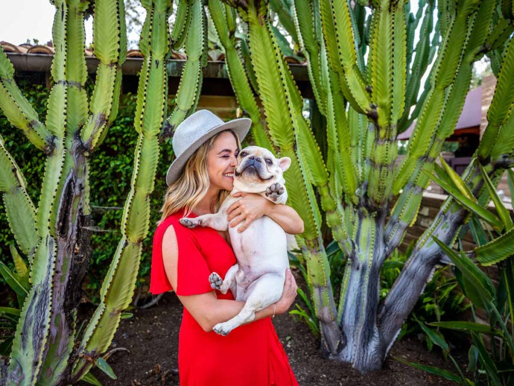 woman holding her dog