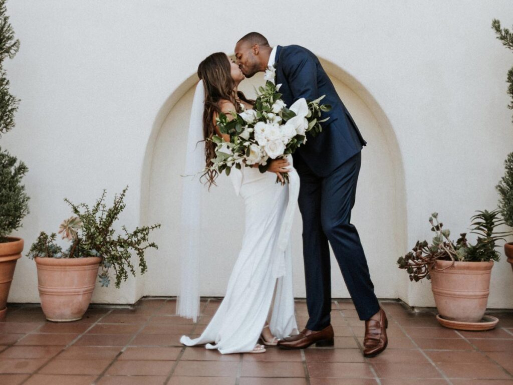 bride and groom kissing