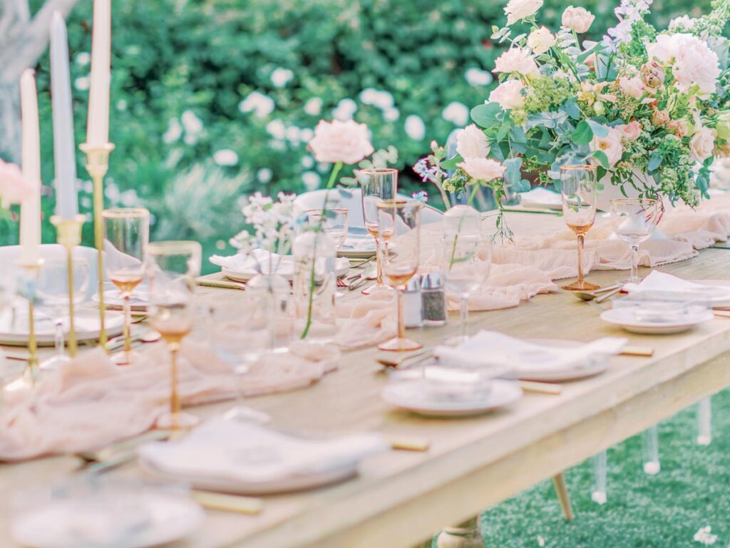 Wedding Reception Table Under Flowery Arbor.