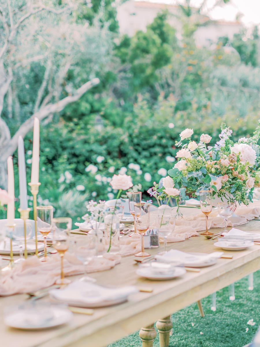 Wedding Reception Table Under Flowery Arbor.