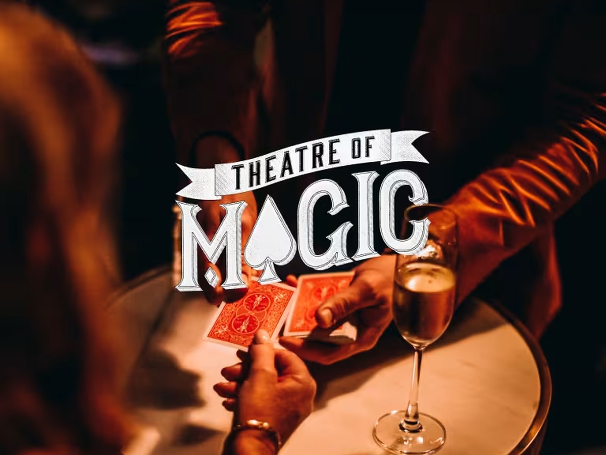 Theatre of Magic close-up card trick performance with champagne at Estancia La Jolla Hotel & Spa in La Jolla, California
